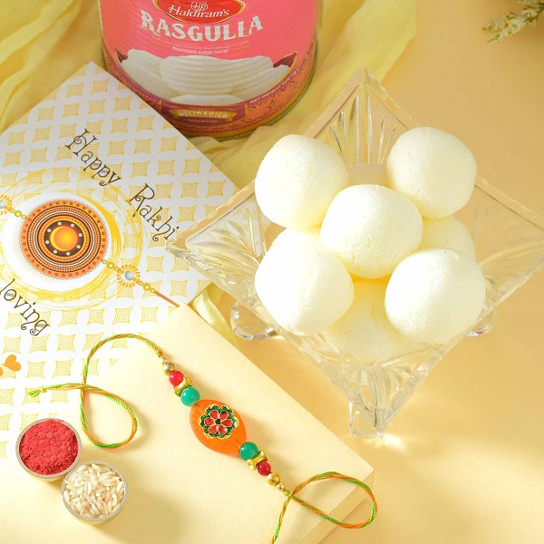 Floral Pebble Rakhi and Rasgulla