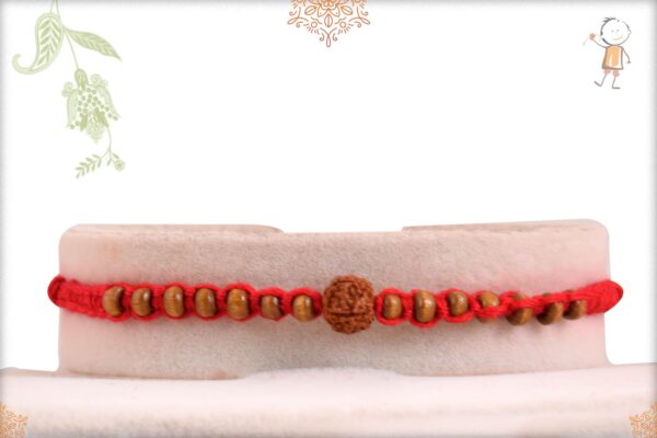 Finely Crafted Rudraksh Rakhi with Sandalwood Beads