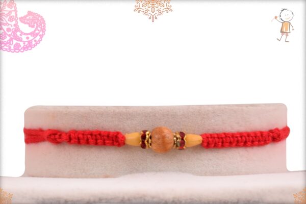 Uniquely Knotted Delicate Sandalwood Diamond Rakhi