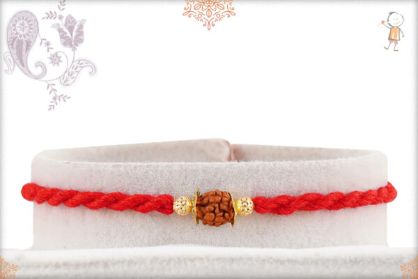 Beautifully Handcrafted Single Rudraksh Rakhi with Golden Beads