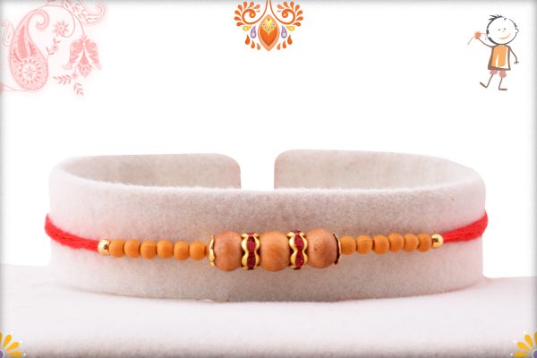 Exclusive Triple Wooden Beads Rakhi With Designer Thread