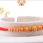Simple Yet Beautiful Wooden Beads With Red Thread Rakhi