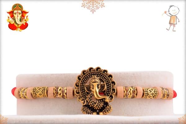 Antique Ganesh Rakhi with Unique Golden Beads