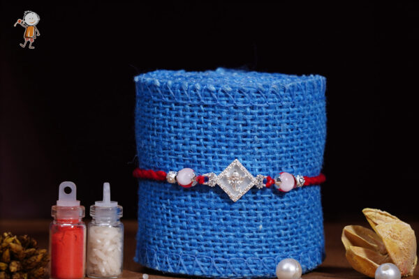 Silver Diamond Ganesh Rakhi with Designer Beads