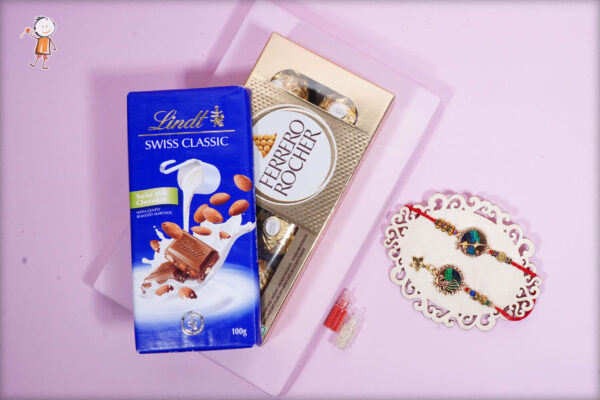 Exclusively Crafted Peacock Rakhi with Lindt Swiss Classic and Ferrero Rocher (8pcs)